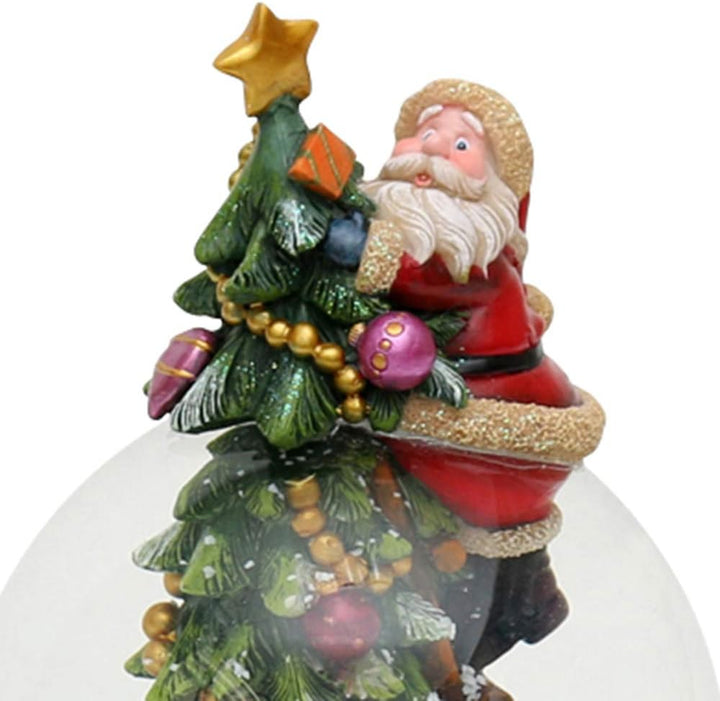 Dekohelden24 Bezaubernde Schneekugel am Tannenbaum, mit Weihnachtsmann und Sound, 500897, Masse H/B/