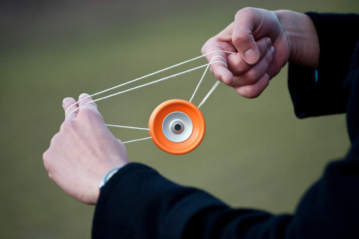 Henrys A00030-1213 Yo- Yo Tiger Snake Ø 61 mm, B 27 mm, 50 g, schw./orange (farblich sortiert)