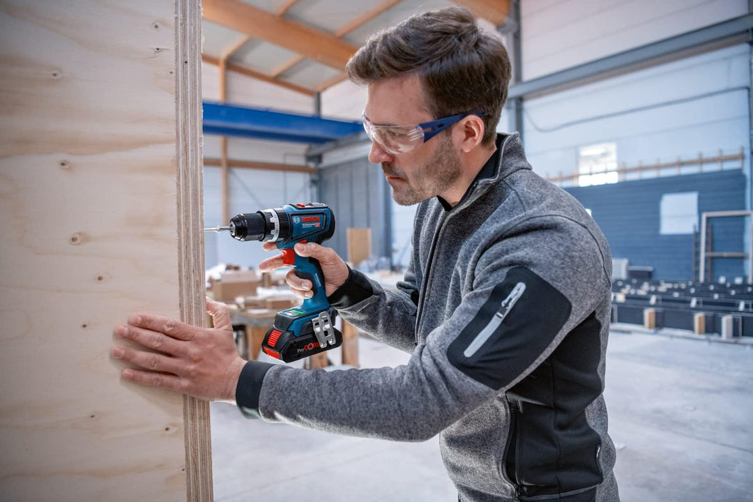 Bosch Professional 18V System Akku Schlagbohrmaschine GSB 18V-90 C (inkl. 2x ProCORE-Akkus 4.0Ah, Sc