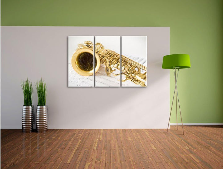 Pixxprint Saxophon auf Notenpapier als Leinwandbild/Grösse: 3 Teilig (120x80) cm/Wandbild/Kunstdruck