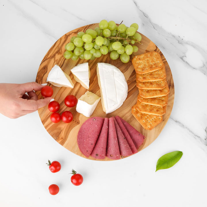 Handgefertigtes rundes Paddelbrett aus Olivenholz – gestreiftes Servierbrett für Käse, Brot und Vors