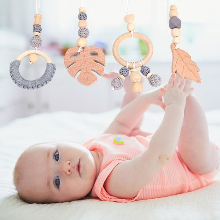 Spielbogen Anhänger, Baby Gyms Holz Babyspielzeug für Autositz Kinderwagen, 4 Stück Spielebögen für