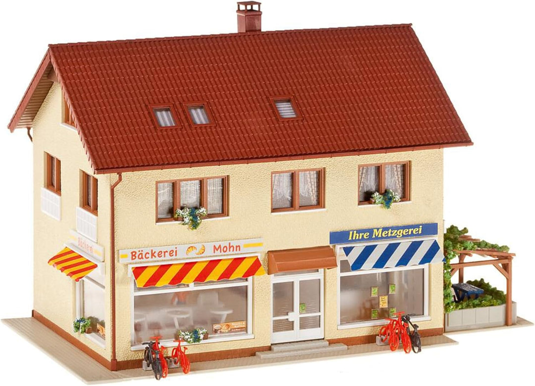 FALLER Metzgerei/Bäckerei Modellbausatz mit 569 Einzelteilen 190x125x125mm I Modelleisenbahn Zubehör