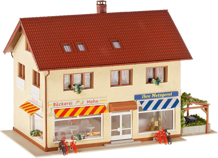 FALLER Metzgerei/Bäckerei Modellbausatz mit 569 Einzelteilen 190x125x125mm I Modelleisenbahn Zubehör