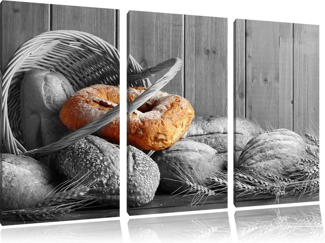 frisch gebackene Brötchen in geflochtenem Korb schwarz/weiss 3-Teiler Leinwandbild 120x80 Bild auf L