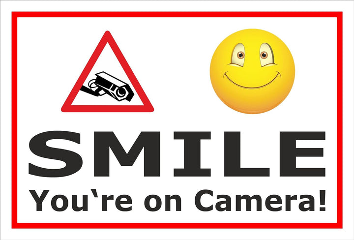 Melis Folienwerkstatt Schild - Smile - You're on Camera - 60x40cm | Bohrlöcher | 3mm Aluverbund – S0