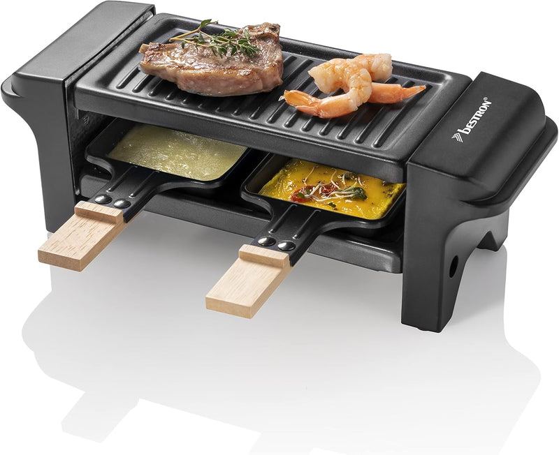 Bestron Raclette für 1 bis 2 Personen, Mini Tischgrill mit zwei Pfännchen, zwei Holzschabern & zwei