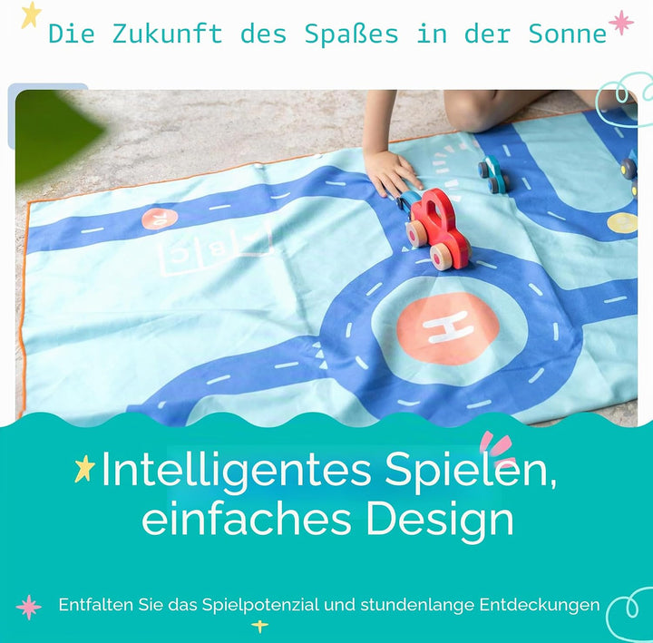 Quut – Strand-/Poolhandtuch für Kinder mit Spiel – Ultraschnell trocknende Mikrofaser, sandfrei – ko