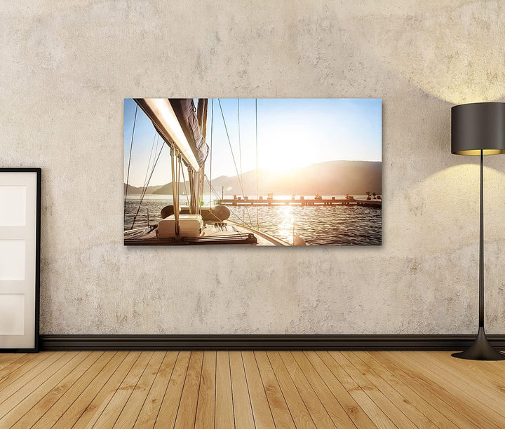 islandburner Bild auf Leinwand Segelboot Auf Dem Meer Mit Steg Bei Sonnenuntergang Bilder Wandbilder