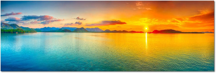 Augenblicke Wandbilder Leinwandbild als Panorama in 150x50cm Meer Hügel Sonnenaufgang Wolkenschleier