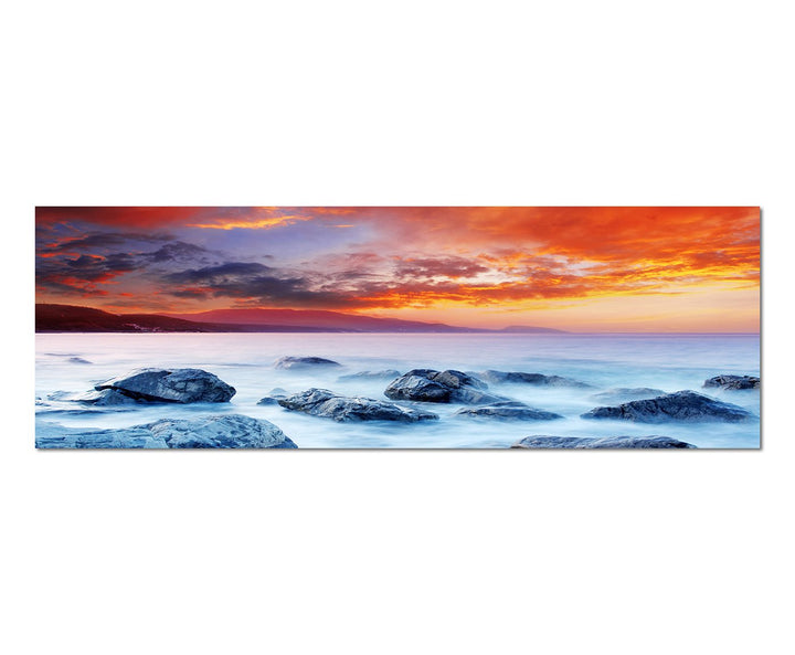 Paul Sinus Art Panoramabild auf Leinwand und Keilrahmen 150x50cm Meer Dunst Sonnenuntergang Steine
