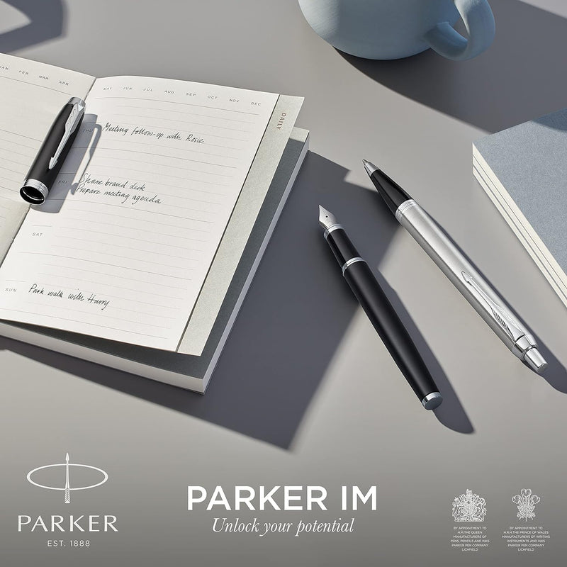 Parker IM Kugelschreiber | Schwarze Lackierung mit Goldzierteilen | Mittlere Spitze | Blau, Schwarze