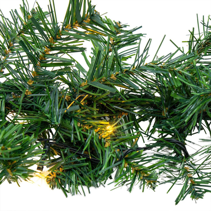 Spetebo Weihnachtsgirlande grün mit 100 LED Lichterkette warmweiss für Aussen - 810 cm - Kunst Tanne