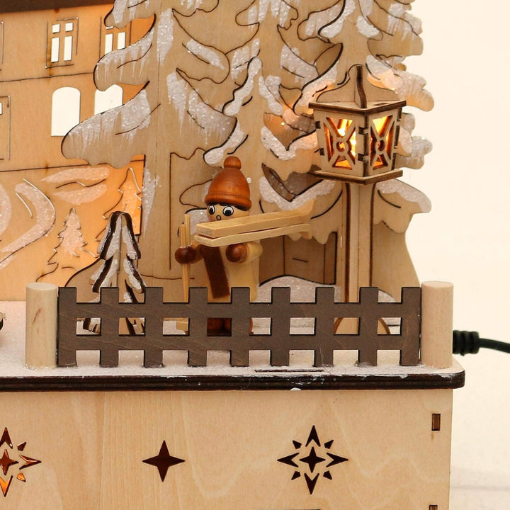 Dekohelden24 LED Holz Schwibbogen mit bewegtem Weihnachtsbaum, Motiv: Weihnachtsmann und Schneekinde