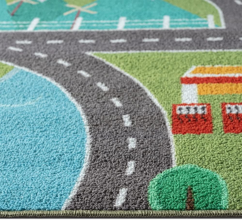 Teppich-Traum Kinder Spielteppich mit Stadtlandschaft auf Wiese in grün Grösse 100x200 cm 100 x 200