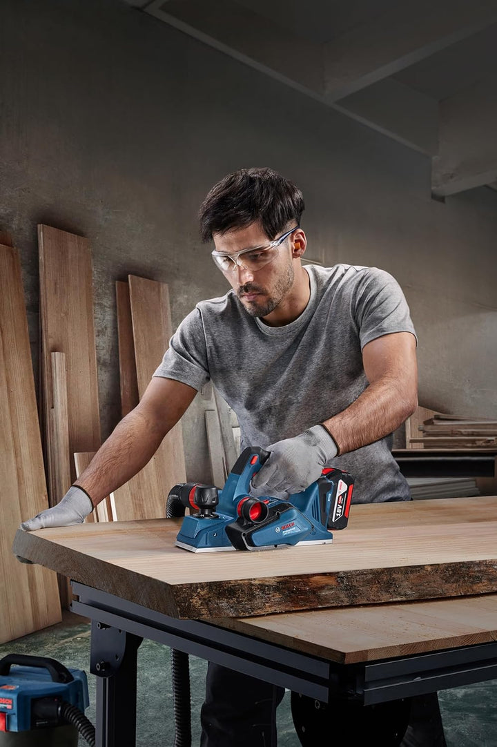 Bosch Professional System 18V: Akkuhobel GHO 185-LI (Montageschlüssel, Führungshalter, Staubbeutel)