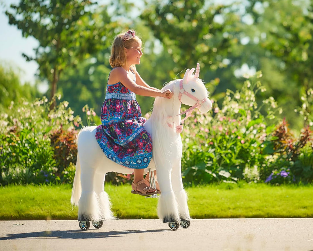 Ponnie Einhorn auf Rollen Merlin - Unicorn M mit rosa Sattel
