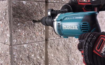 Makita HP1631KX3 Schlagbohrmaschine im Koffer, 710 W + 74tlg. Zubehör