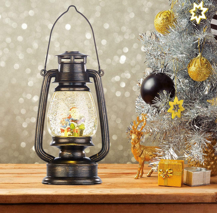 infactory Weihnachtslaternen: Deko-LED-Laterne im Öllampen-Look, mit Schneewirbel und Weihnachtsmann