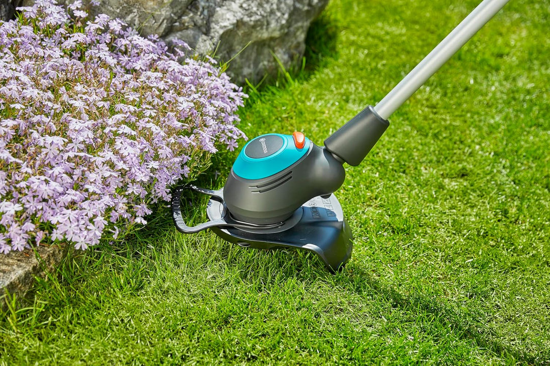 Gardena Elektro-Trimmer EasyCut 450/25: Rasentrimmer mit verstellbarem Griff abwinkelbarem Trimmerko