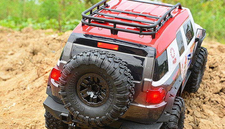 Amewi 22592 Dirt Climbing SUV Race Crawler 4WD 1:10 RTR weiss/rot, inkl. Fernsteuerung, Akku, Ladeka
