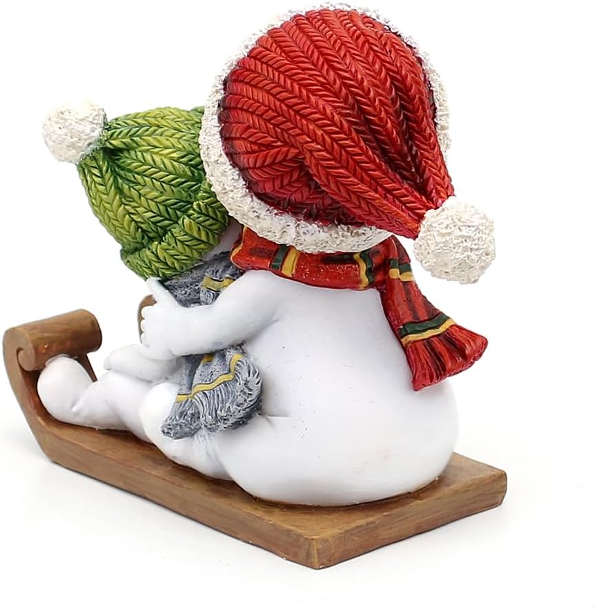 Dekohelden24 Schneekinderpaar - Schneemänner mit Mütze und Schal in rot-grün auf Schlitten, L/B/H 14