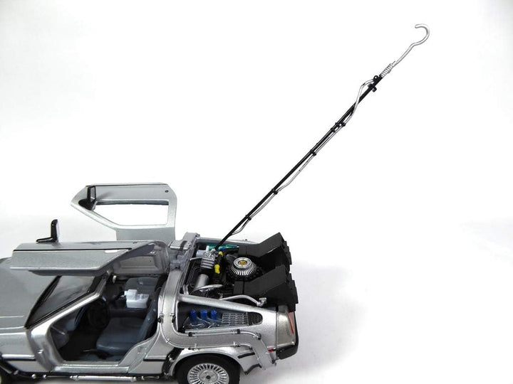 OPO 10 - Welly - Lot von 4 Delorean-Autos von Back to The Future - Filmen - Massstab 1:24 (Ref: L4)