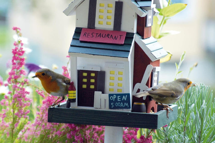 dobar® 25307FSC Buntes Vogelfutterhaus Restaurant - Vogelhaus inklusive Ständer Western Style - Klei