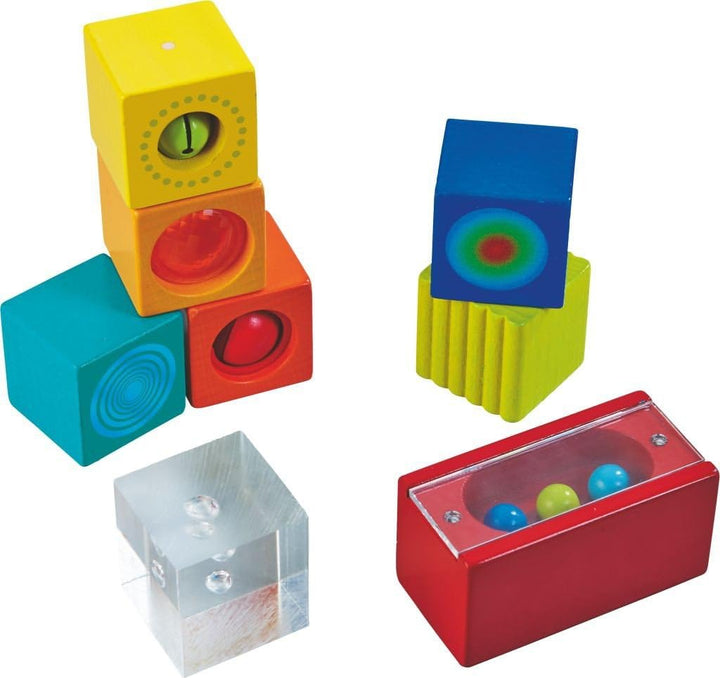 HABA Entdeckersteine Farbenspass – Sensorikspielzeug für Kinder ab 12 Monaten – 6 Bunte Würfel mit v