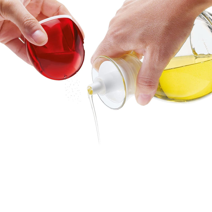Guzzini - Gocce, Matrioska:Olkaraffe-Salzstreuer/Essigkaraffe-Pfefferstreuer - Transparent, 9,4 x h1