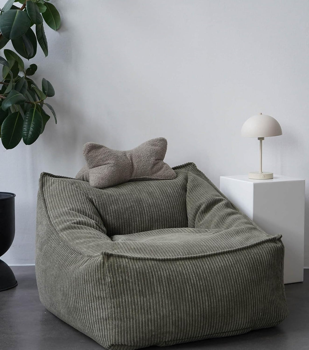 mokebo Lesekissen aus weichen Bouclé-Stoff 'Der Leseknochen', ergonomisches Nackenkissen aus gemütli