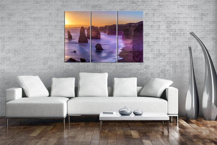 deyoli Atemberaubender Sandstrand im Sonnenuntergang Format: 3-teilig 120x80 als Leinwand, Motiv fer