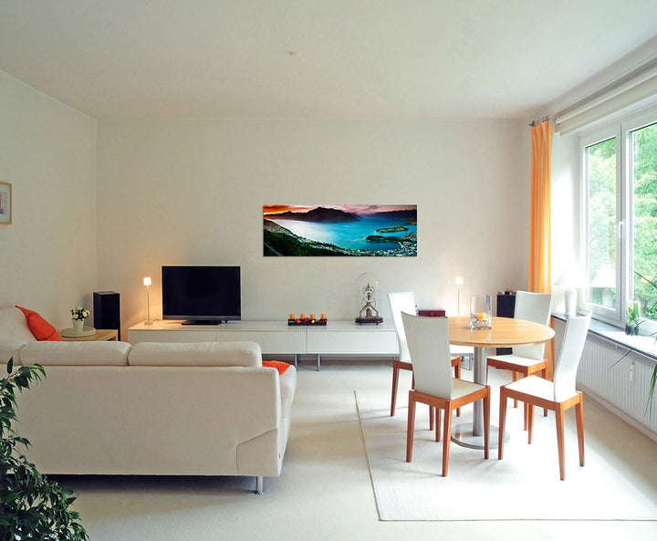 Paul Sinus Art Panoramabild auf Leinwand und Keilrahmen 150x50cm See Stadt Berge Landschaft Dämmerun
