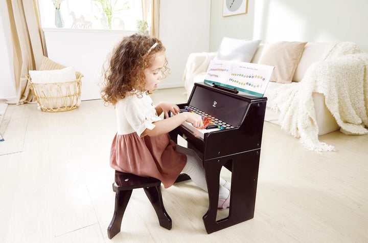 Hape Leuchttasten-Piano mit Hocker und Notenhalter, Musikspielzeug aus Holz, ab 3 Jahren, Schwarz