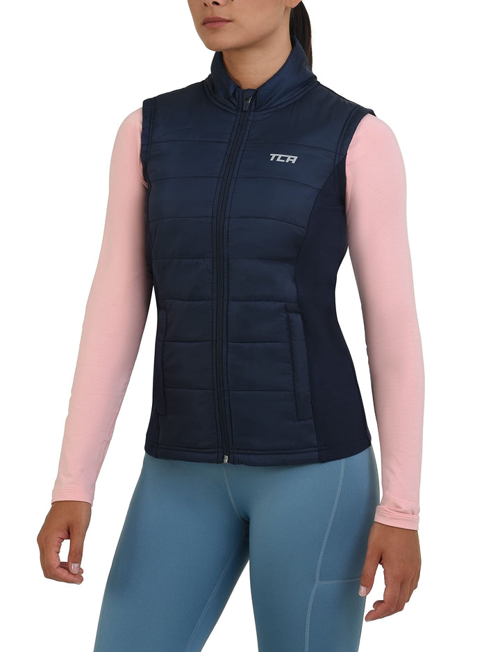 TCA Damen und Mädchen Excel Runner Leichte Laufweste mit Reissverschlusstaschen L Dunkelblau, L Dunk