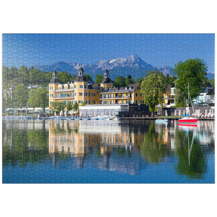 Schlosshotel am See gegen Mittagskogel (2143m), Velden, Wörther See, Österreich - Premium 1000 Teile