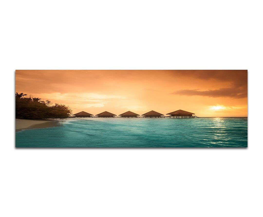 Paul Sinus Art Panoramabild auf Leinwand und Keilrahmen 150x50cm Meer Strand Steg Bungalows Abendson