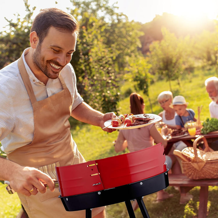 Relaxdays Holzkohlegrill mit Rollen, Ø 42 cm, Picknickgrill Garten & Park, Griller, Windschutz, Rund