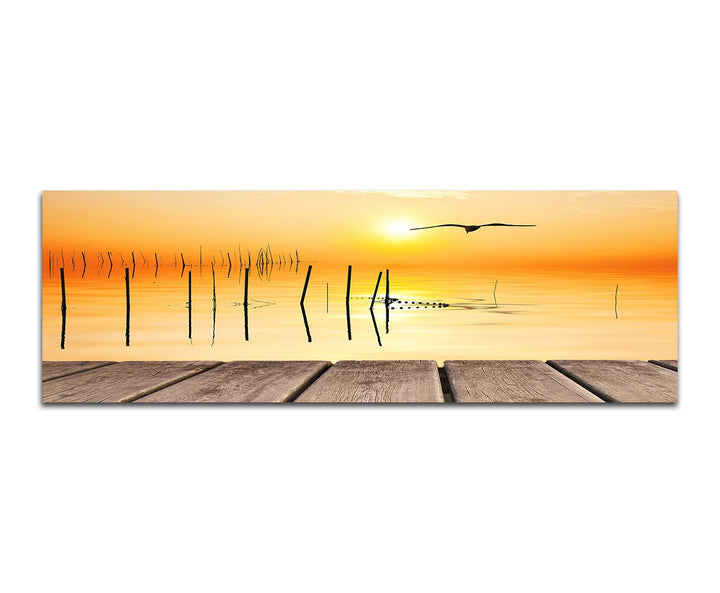 Paul Sinus Art Panoramabild auf Leinwand und Keilrahmen 150x50cm Meer Holzsteg Möwe Sonnenuntergang