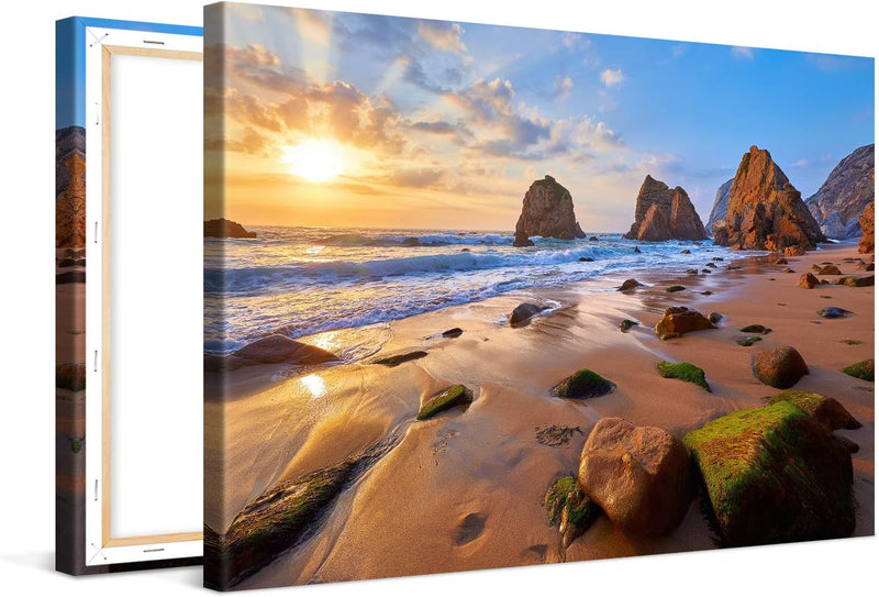 PICANOVA – Bild auf Leinwand Meeresstrand mit Felsen 120x80cm – Leinwandbild – Premium Leinwanddruck