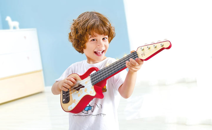 Hape Elektrische Ukulele mit stimmbaren Saiten und Führungslichtern für Kinder ab 3 Jahren, rot