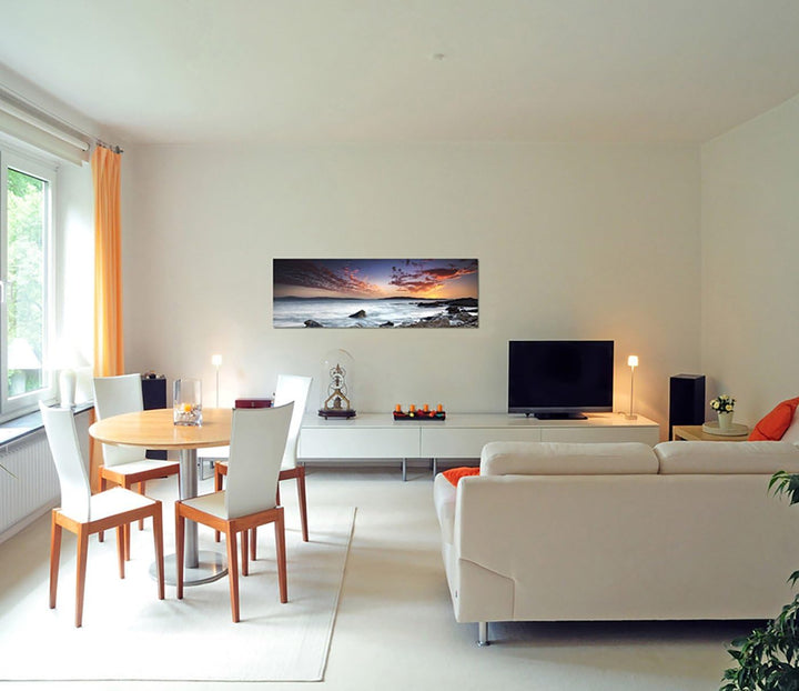 Paul Sinus Art Panoramabild auf Leinwand und Keilrahmen 150x50cm Meer Steine Felsen Abendhimmel