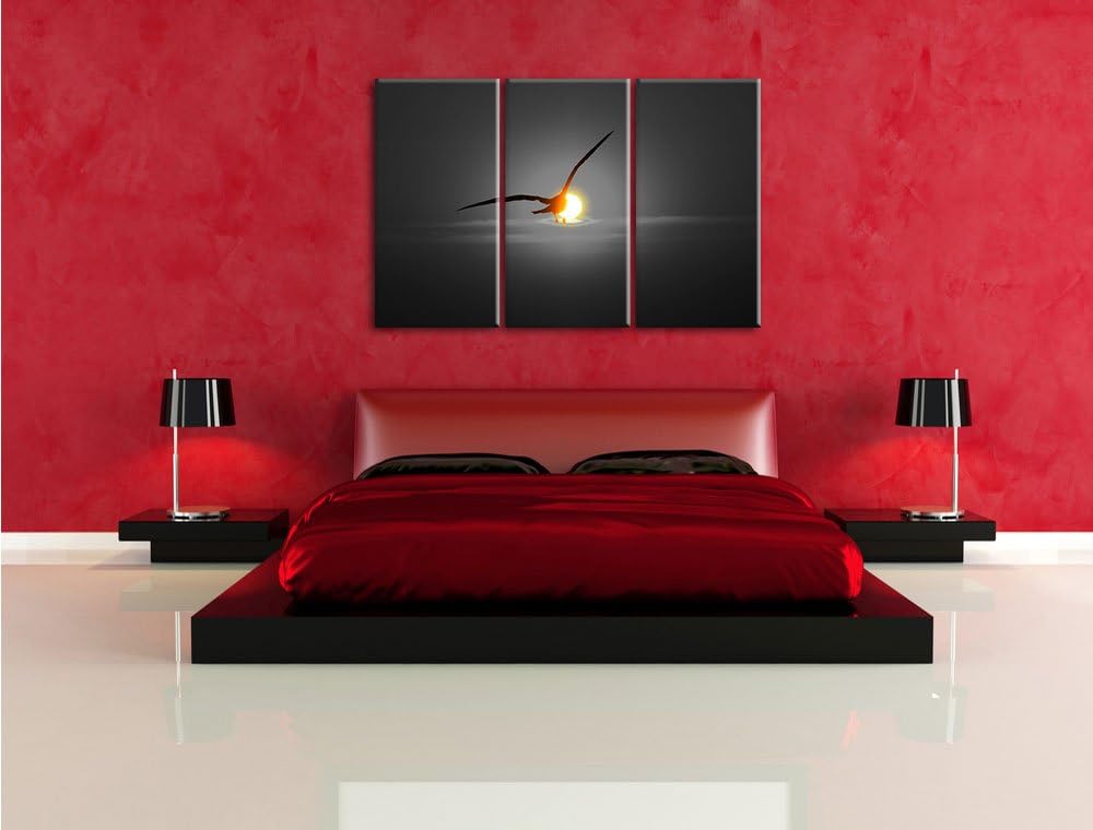 Pixxprint Möwe fliegt in den Sonnenuntergang als Leinwandbild/Grösse: 3 Teilig (120x80) cm/Wandbild/