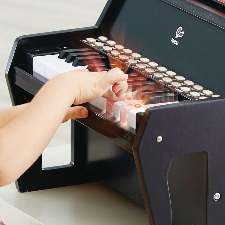 Hape Leuchttasten-Piano mit Hocker und Notenhalter, Musikspielzeug aus Holz, ab 3 Jahren, Schwarz