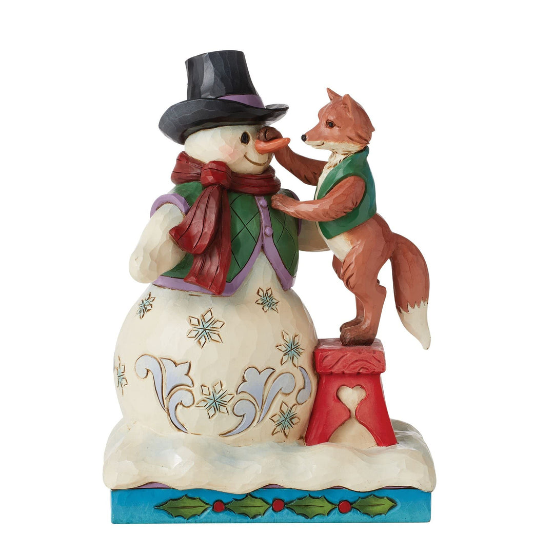 Schneemann mit Fuchs