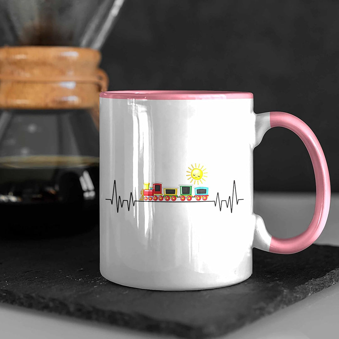 Trendation - Zug Züge Herzschlag Tasse Geschenk für Eisenbahner Zugführer Hobby Geschenkidee (Rosa),