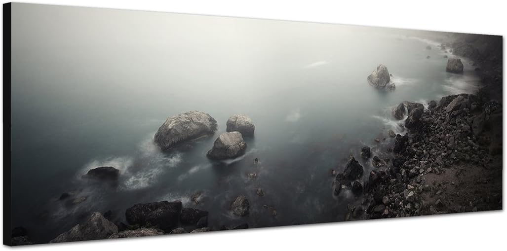 Paul Sinus Art Panoramabild auf Leinwand und Keilrahmen 150x50cm Meer Steine Felsen Morgendämmerung