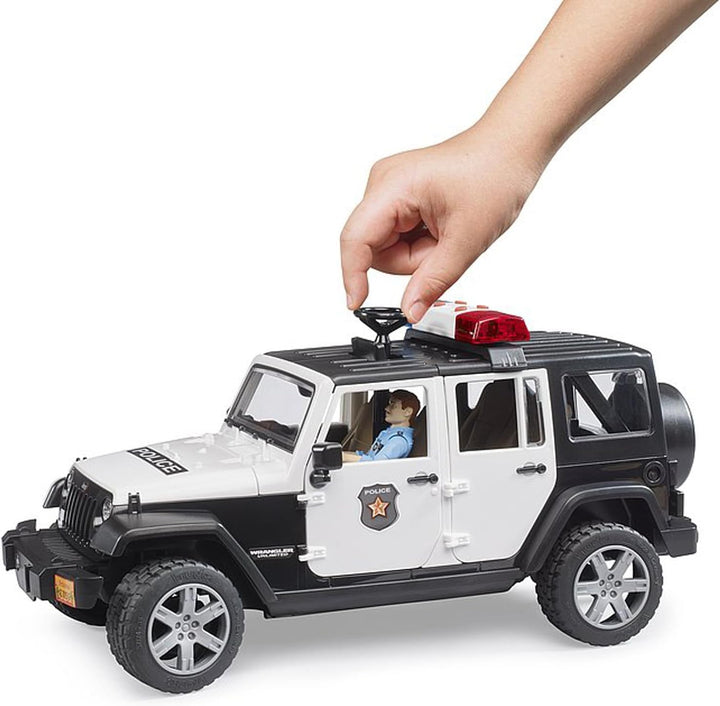 bruder 02526 - Jeep Wrangler Unlimited Rubicon Polizei Fahrzeug mit Polizist & Ausstattung, Light &