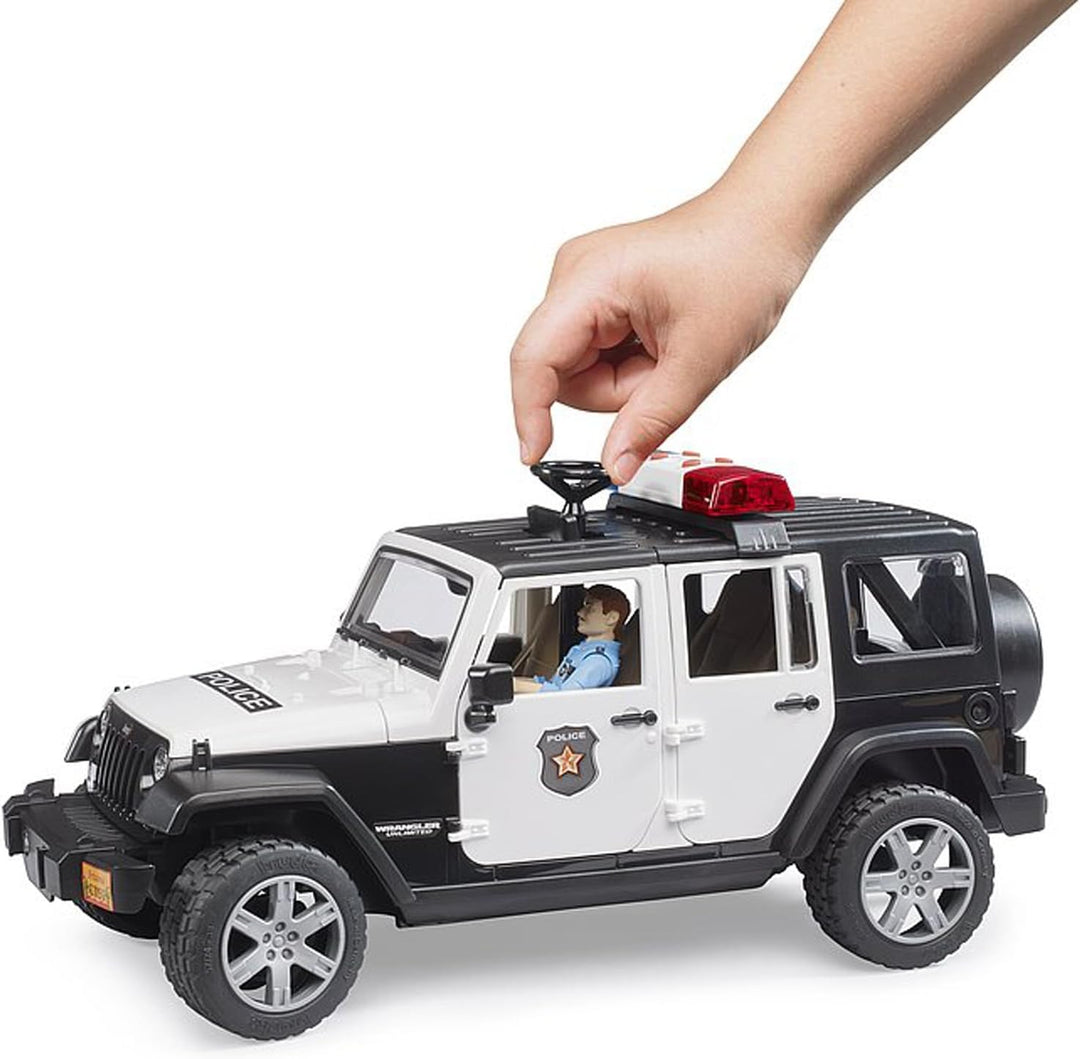 bruder 02526 - Jeep Wrangler Unlimited Rubicon Polizei Fahrzeug mit Polizist & Ausstattung, Light &