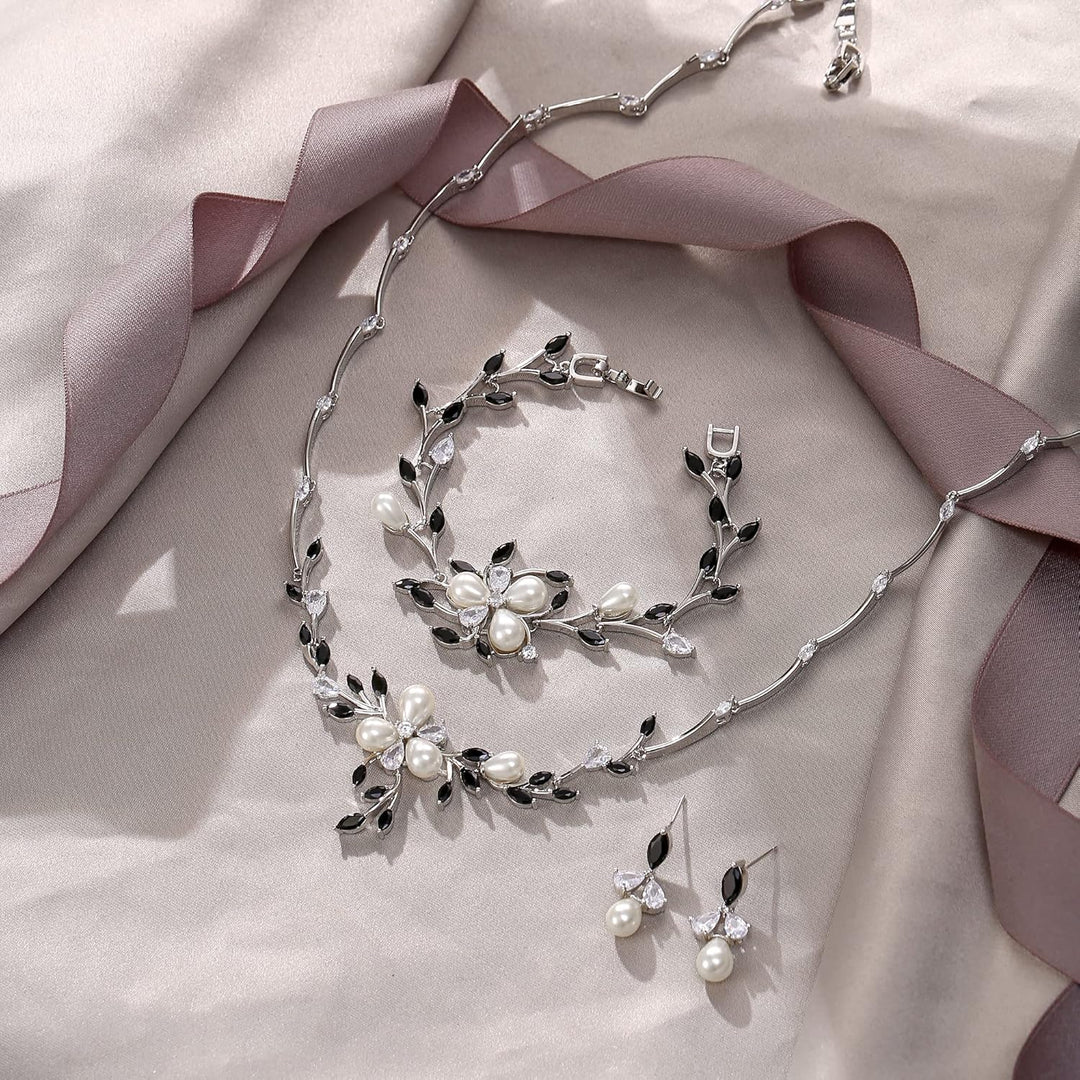 EVER FAITH Zirkon Simulierte Perle Blume Blatt Filigrane Halskette Ohrringe Armband Set Klar Schwarz